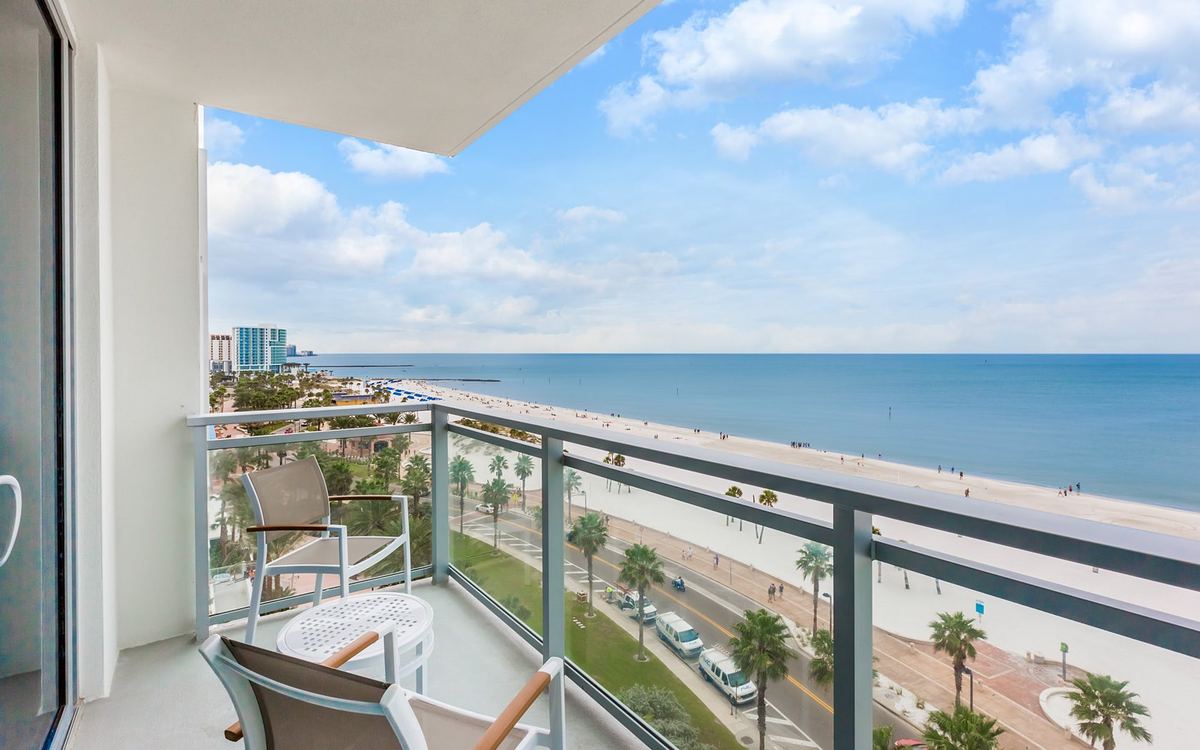 A guest room balcony looking along Clearwater Beach and the Gulf